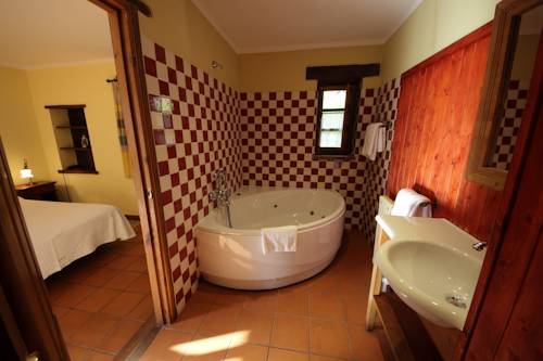 Imagen de la habitación del Hotel La Montaña Mágica Rural. Foto 15