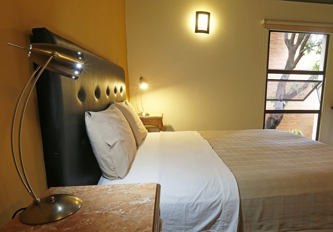 Imagen de la habitación del Hotel La Morada Posada Boutique. Foto 6