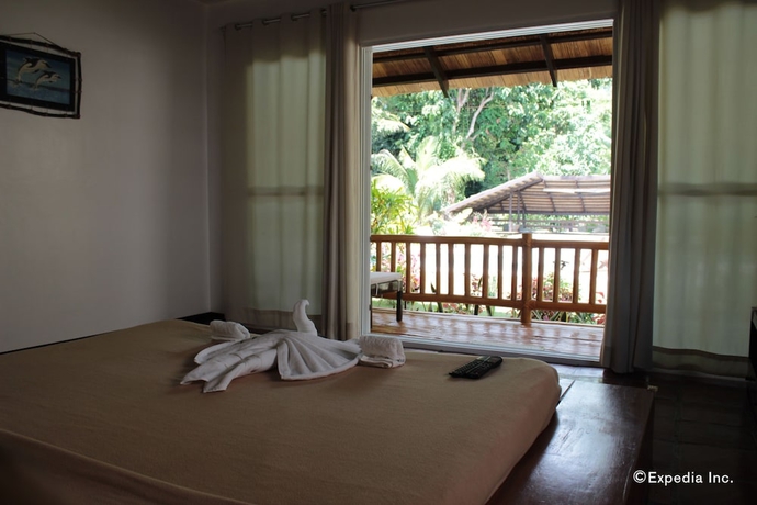 Imagen de la habitación del Hotel La Natura Resort. Foto 8