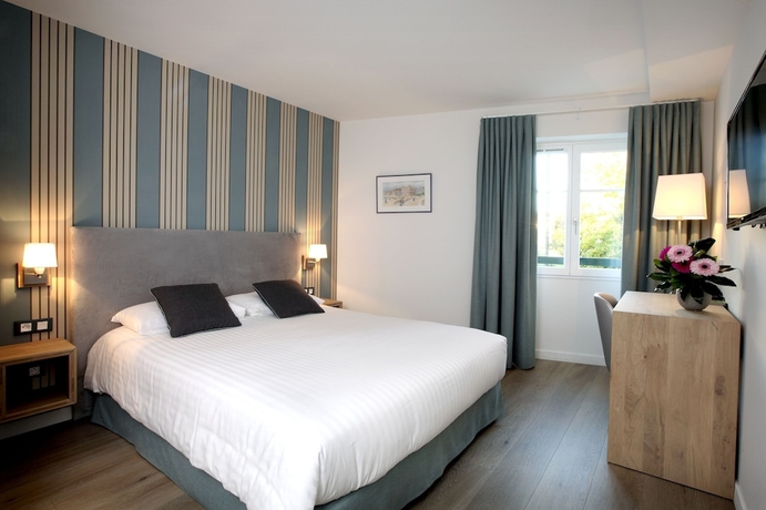 Imagen de la habitación del Hotel La Nivelle. Foto 17