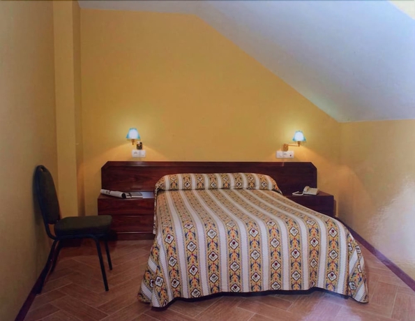 Imagen de la habitación del Hotel La Nueva Allandesa Hotel. Foto 7