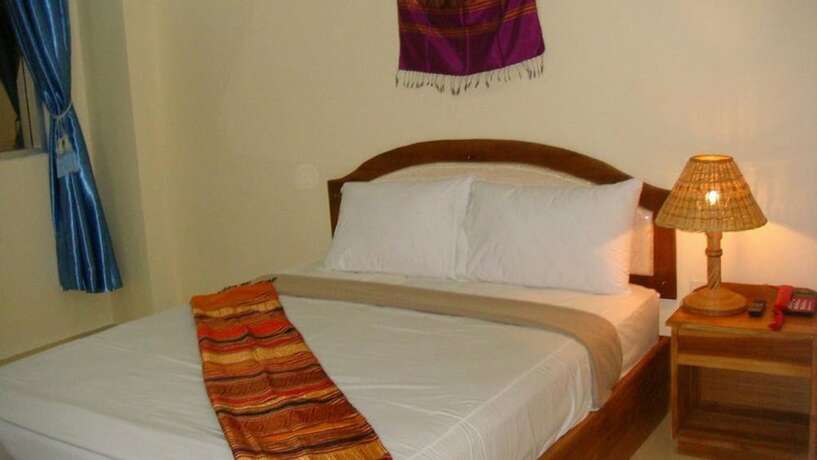Imagen de la habitación del Hotel La Ong Dao 1. Foto 17