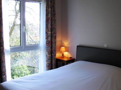 Imagen de la habitación del Hotel La Paix. Foto 10