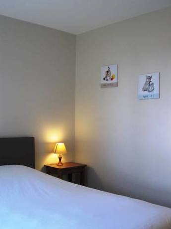 Imagen de la habitación del Hotel La Paix. Foto 12