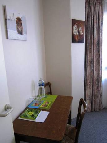 Imagen de la habitación del Hotel La Paix. Foto 15