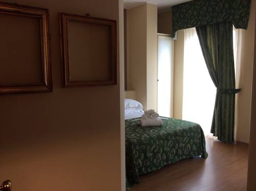 Imagen de la habitación del Hotel La Palazzina. Foto 9