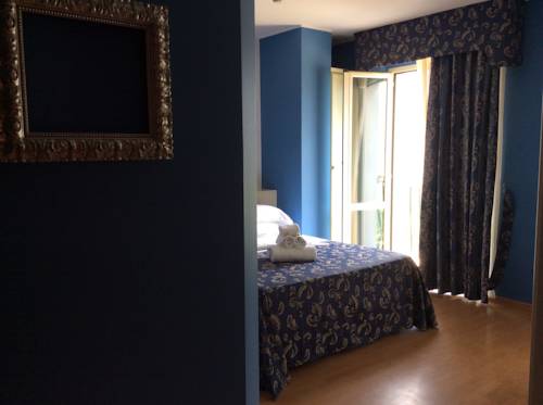 Imagen de la habitación del Hotel La Palazzina. Foto 10