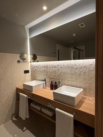Imagen de la habitación del Hotel La Palloza. Foto 9