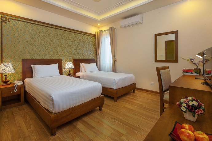 Imagen de la habitación del Hotel La Palm. Foto 10