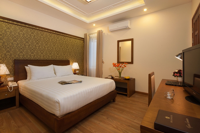 Imagen de la habitación del Hotel La Palm. Foto 12