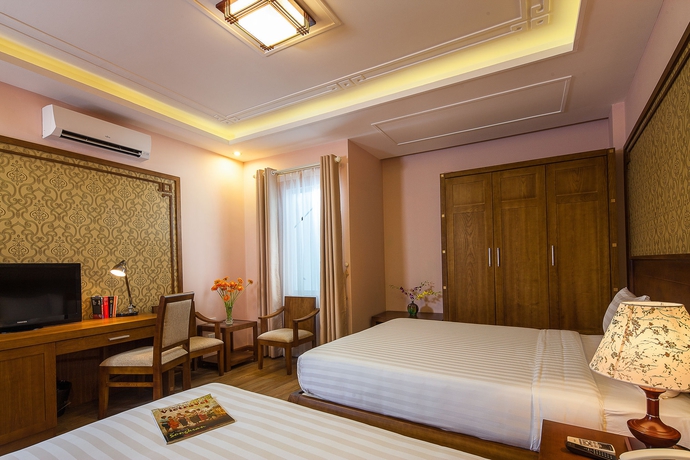 Imagen de la habitación del Hotel La Palm. Foto 13