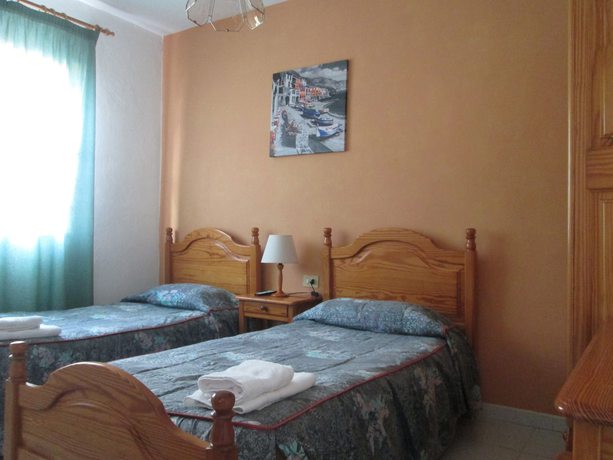 Imagen de la habitación del Hotel La Palma Hostel - Pensi&oacute;n Central. Foto 12