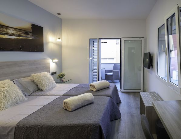 Imagen de la habitación del Hotel La Palmera Hotel Boutique. Foto 7