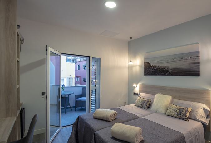 Imagen de la habitación del Hotel La Palmera Hotel Boutique. Foto 9