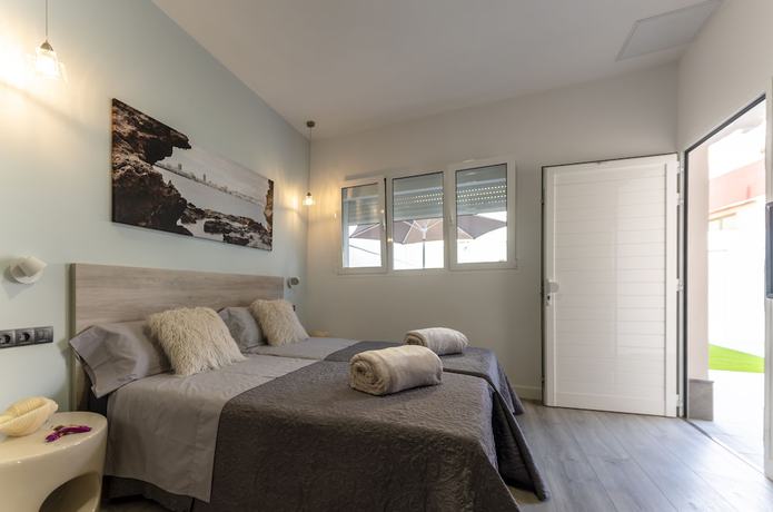 Imagen de la habitación del Hotel La Palmera Hotel Boutique. Foto 11