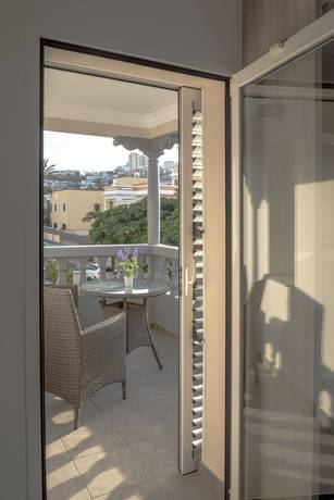 Imagen de la habitación del Hotel La Palmera Hotel Boutique. Foto 12