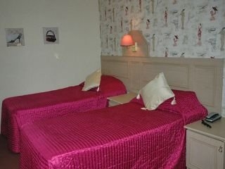 Imagen de la habitación del Hotel La Parisienne Hotel. Foto 3