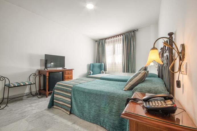 Imagen de la habitación del Hotel La Parrita. Foto 14