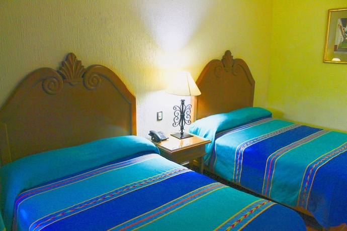 Imagen de la habitación del Hotel La Parroquia. Foto 12