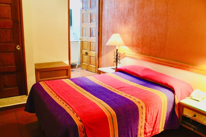 Imagen de la habitación del Hotel La Parroquia. Foto 15