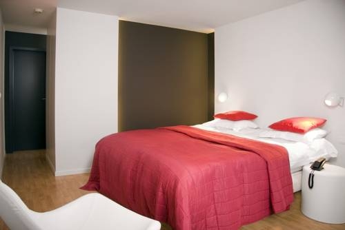 Imagen de la habitación del Hotel La Passerelle. Foto 7