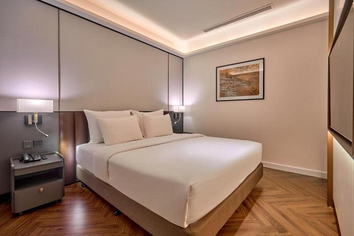 Imagen de la habitación del Hotel La Passion Saigon. Foto 6