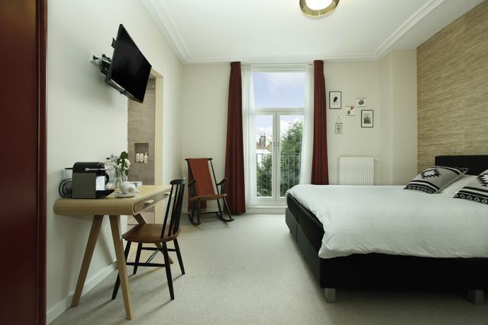 Imagen de la habitación del Hotel La Paulowna Boutique. Foto 9