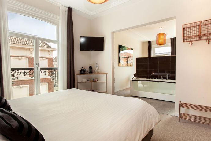 Imagen de la habitación del Hotel La Paulowna Boutique. Foto 10