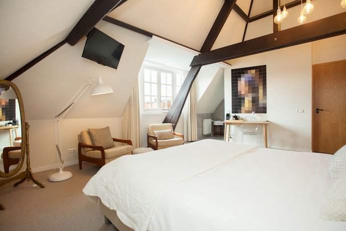 Imagen de la habitación del Hotel La Paulowna Boutique. Foto 16