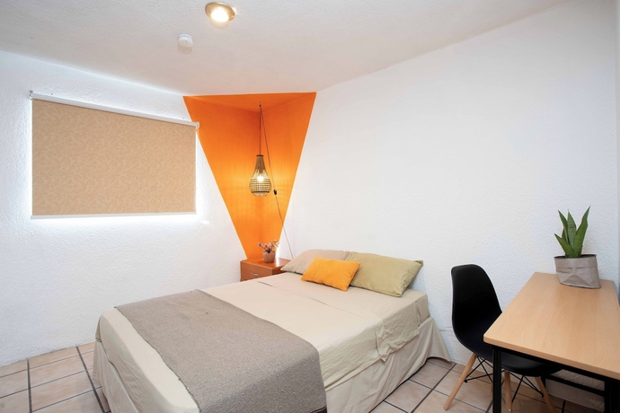 Imagen de la habitación del Hotel La Paz and Love Hostel. Foto 7