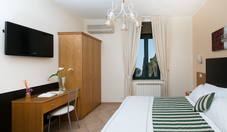 Imagen de la habitación del Hotel La Pensione Svizzera. Foto 2