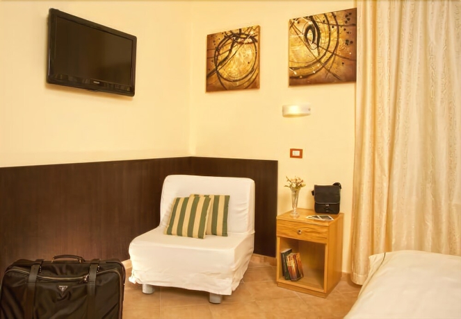 Imagen de la habitación del Hotel La Pensione Svizzera. Foto 14