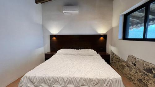 Imagen de la habitación del Hotel La Pe&ntilde;a Boutique & SPA. Foto 16