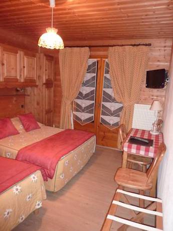 Imagen de la habitación del Hotel La Perdrix Blanche. Foto 14