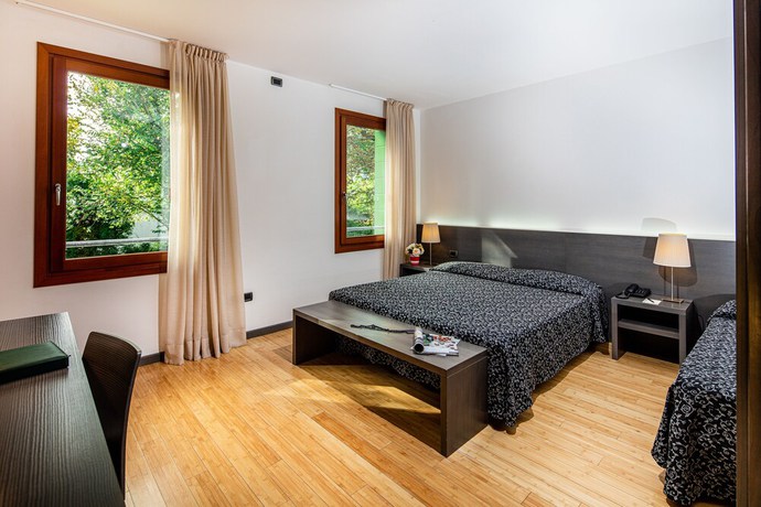 Imagen de la habitación del Hotel La Pergola, Lignano Sabbiadoro. Foto 7
