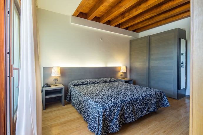 Imagen de la habitación del Hotel La Pergola, Lignano Sabbiadoro. Foto 13