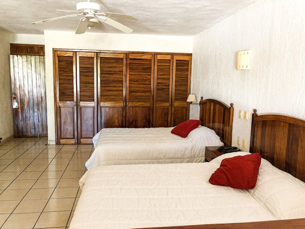 Imagen de la habitación del Hotel La Pergola Manzanillo. Foto 14