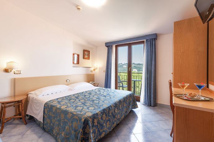 Imagen de la habitación del Hotel La Pergoletta. Foto 14