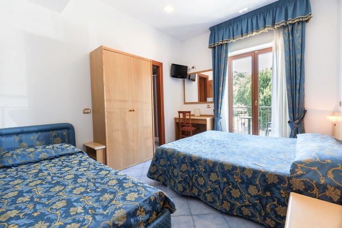 Imagen de la habitación del Hotel La Pergoletta. Foto 15