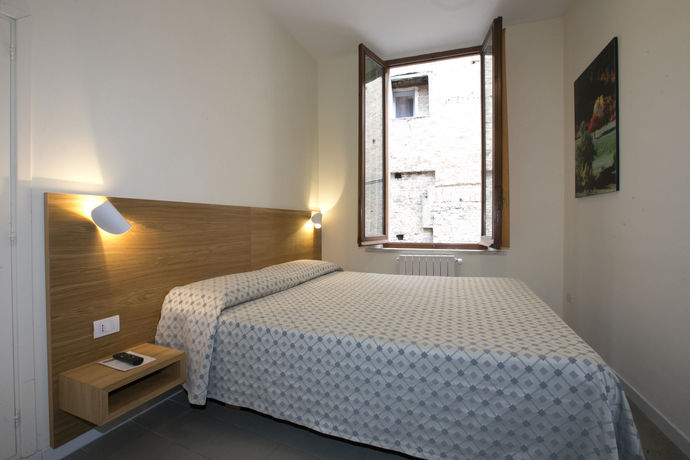 Imagen de la habitación del Hotel La Perla, Siena. Foto 12