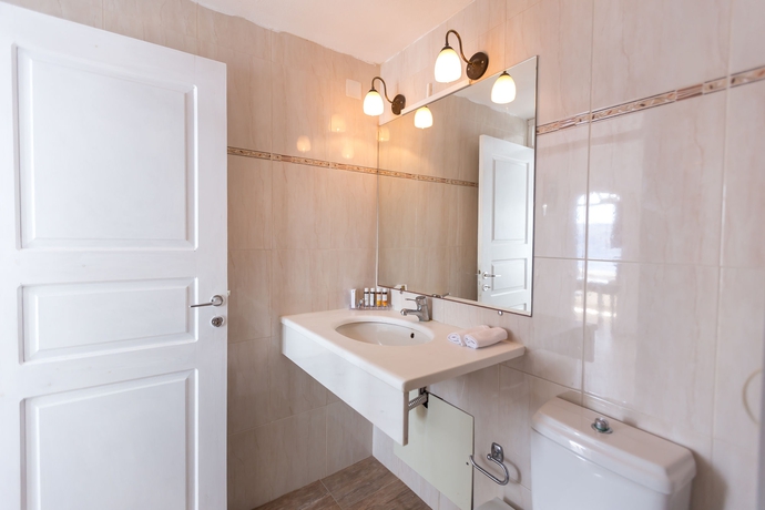 Imagen de la habitación del Hotel La Perla Villas and Suites - Adults Only. Foto 8