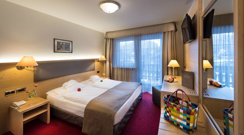 Imagen de la habitación del Hotel La Perla Wellness And Beauty. Foto 10
