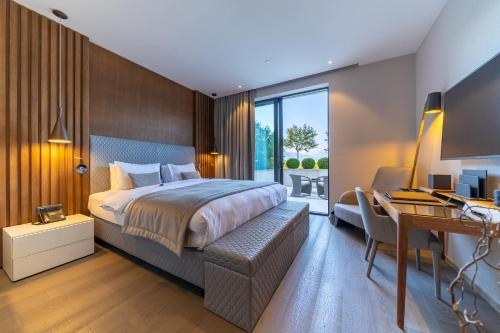 Imagen de la habitación del Hotel La Perla & Villas. Foto 10