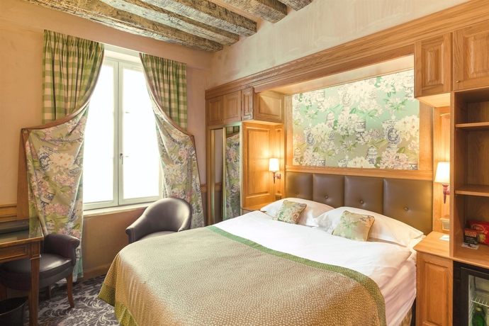 Imagen de la habitación del Hotel La Perle. Foto 3