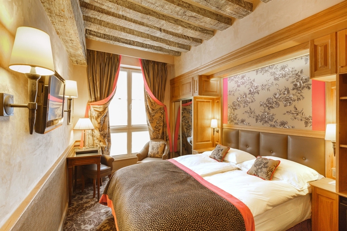Imagen de la habitación del Hotel La Perle. Foto 4