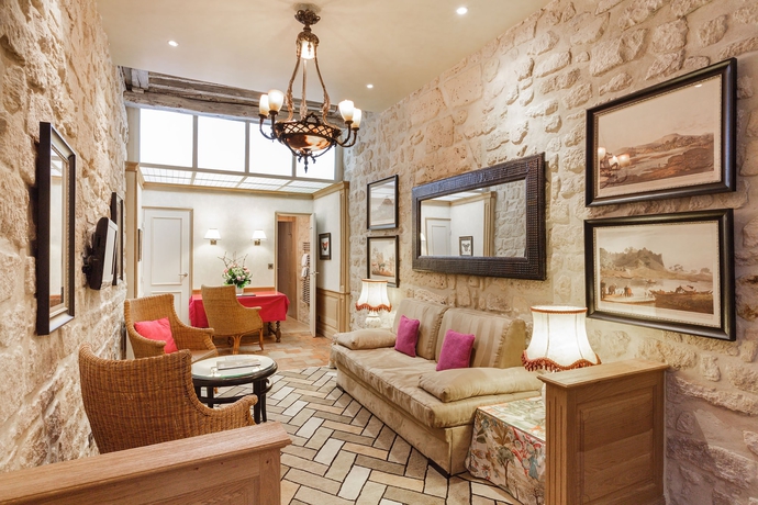Imagen de la habitación del Hotel La Perle. Foto 5