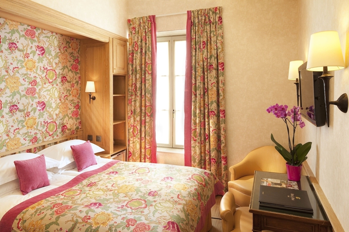Imagen de la habitación del Hotel La Perle. Foto 9