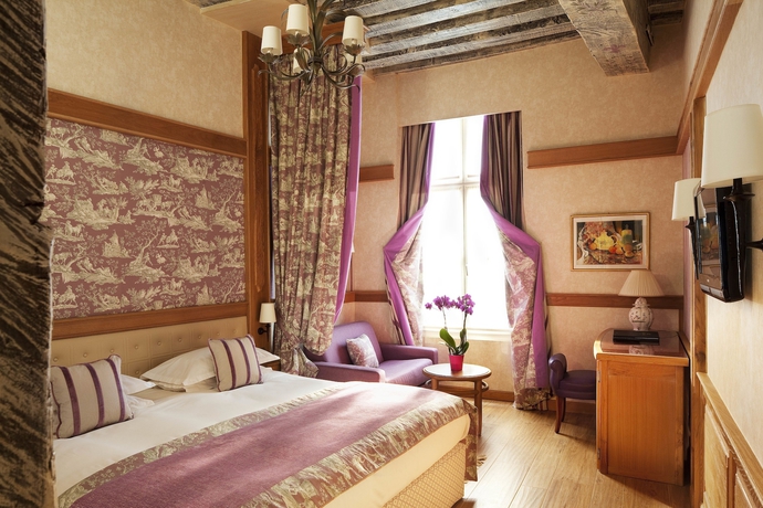 Imagen de la habitación del Hotel La Perle. Foto 17