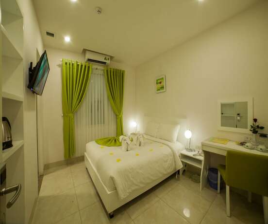 Imagen de la habitación del Hotel La Perle Hue. Foto 12