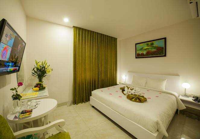 Imagen de la habitación del Hotel La Perle Hue. Foto 13